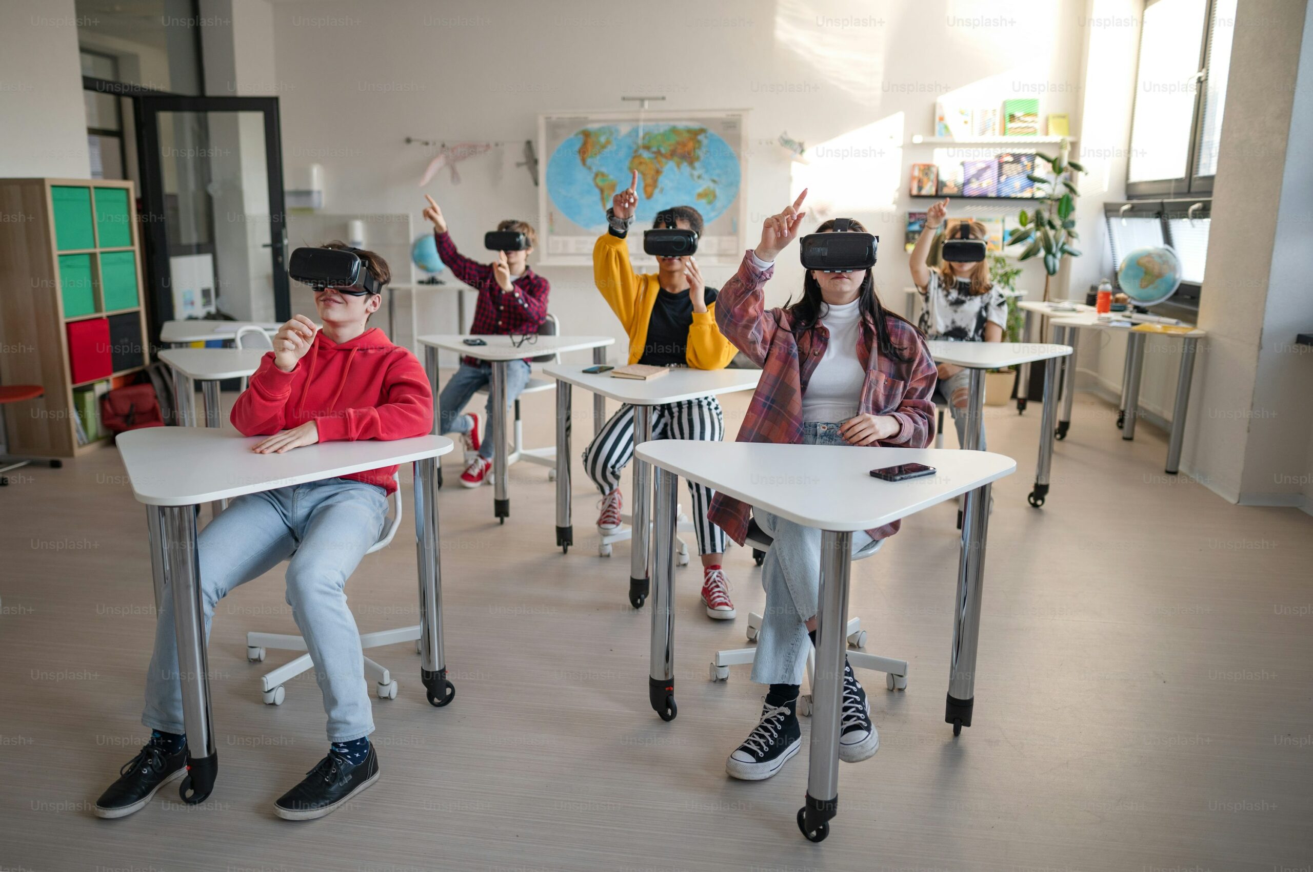 Students engaged in digital learning using STEM tools like robotics and VR in a tech-driven classroom.